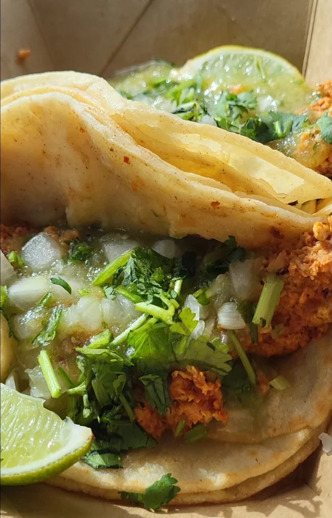 Street Kitchen's crispy chicken taco. Toppings on this one include salsa verde, cilantro, and chopped onion.